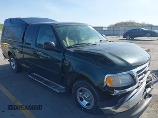 2003 Ford F-150 XL with VIN 2FTRX17W63CA69453, listed as a IAAI auction lot 42217465 with 198,248 mi miles and . Bid and sale history available at DreamBid. Image 1.