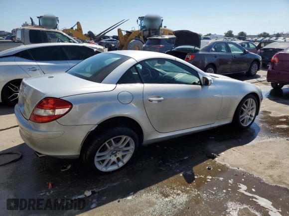 2007 Mercedes-Benz SLK-Class 3.0L with VIN WDBWK54F37F154451, listed as a Copart auction lot 77762834 with 132,496 mi miles and Salvage Title. Bid and sale history available at carsss.com. Image 3.