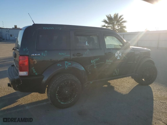 2011 Dodge Nitro Heat with VIN 1D4PU4GX2BW565964, listed as a Copart auction lot 88368995 with 129,160 mi miles and Salvage Title. Bid and sale history available at carsss.com. Image 3.