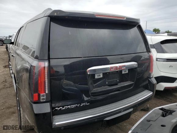2015 GMC Yukon XL Denali with VIN 1GKS1JKJXFR298440, listed as a Copart auction lot 74685984 with 0 mi miles and Salvage Title. Bid and sale history available at carsss.com. Image 6.