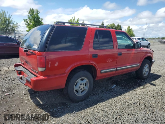 2000 Chevrolet Blazer LT z VIN 1GNDT13W8Y2392666, wystawiony jako Copart lot #56652895 z przebiegiem 223 924 mil mil oraz Szkoda całkowita • Salvage title. Historia ofert i sprzedaży dostępna na DreamBid. Obrazek 3.