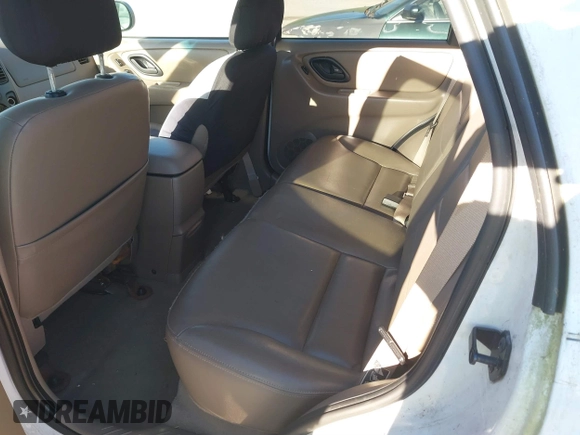 2002 Ford Escape XLT with VIN 1FMCU03112KC92704, listed as a IAAI auction lot 41807550 with 105,762 mi miles and . Bid and sale history available at DreamBid. Image 8.