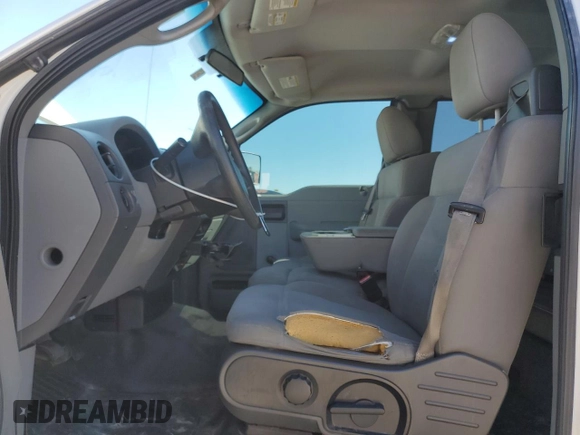 2006 Ford F-150 STX with VIN 1FTRX02W46KC45336, listed as a Copart auction lot 46546915 with 167,228 mi miles and Salvage title. Bid and sale history available at DreamBid. Image 7.