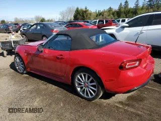 2017 FIAT 124 Spider Lusso z VIN JC1NFAEKXH0106484, wystawiony jako Copart lot #55729775 z przebiegiem 104 341 mil mil oraz Tytuł czysty. Historia ofert i sprzedaży dostępna na DreamBid. Obrazek 2.