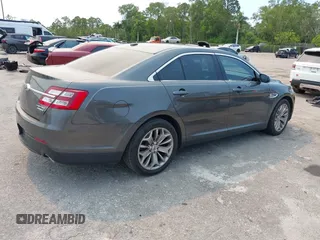 2018 Ford Taurus Limited z VIN 1FAHP2F8XJG129966, wystawiony jako IAAI lot #42319661 z przebiegiem 112 937 mil mil oraz . Historia ofert i sprzedaży dostępna na DreamBid. Obrazek 4.