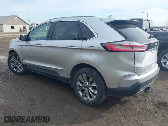 2019 Ford Edge Titanium with VIN 2FMPK4K97KBC27890, listed as a IAAI auction lot 41553163 with 103,750 mi miles. Bid and sale history available at carsss.com. Image 3.