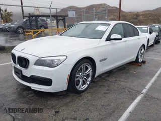 2013 BMW 7 Series 740i with VIN WBAYA6C57DC995338, listed as a IAAI auction lot 41479077 with 123,680 mi miles and . Bid and sale history available at DreamBid. Image 2.