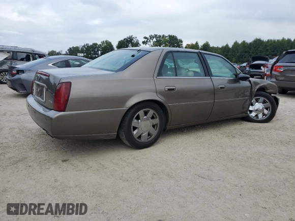 2000 Cadillac DeVille DTS z VIN 1G6KF5794YU249059, wystawiony jako Copart lot #71614494 z przebiegiem 121 611 mil mil oraz Szkoda całkowita • Salvage title. Historia ofert i sprzedaży dostępna na DreamBid. Obrazek 3.