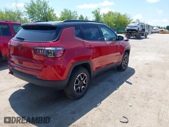 2025 Jeep Compass Trailhawk with VIN 3C4NJDDNXST551154, listed as a IAAI auction lot 42573595 with 4,392 mi miles and . Bid and sale history available at DreamBid. Image 4.