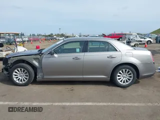2014 Chrysler 300 with VIN 2C3CCAAG3EH322855, listed as a IAAI auction lot 42053129 with 172,687 mi miles. Bid and sale history available at carsss.com. Image 15.