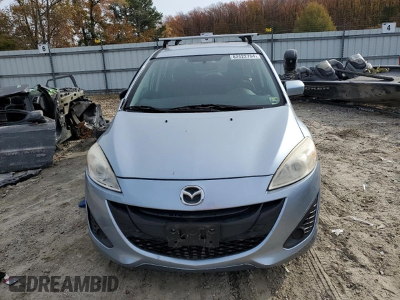 2012 Mazda 5 Sport с VIN JM1CW2BL2C0118957, выставлен на аукционе Copart как лот 82622764 с пробегом 107 691 миль миль и Списание • Salvage title. История ставок и продаж доступна на DreamBid. Изображение 5.