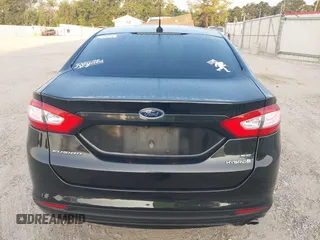 2015 Ford Fusion SE Hybrid with VIN 3FA6P0LU8FR310626, listed as a IAAI auction lot 40048581 with 124,086 mi miles and . Bid and sale history available at DreamBid. Image 16.