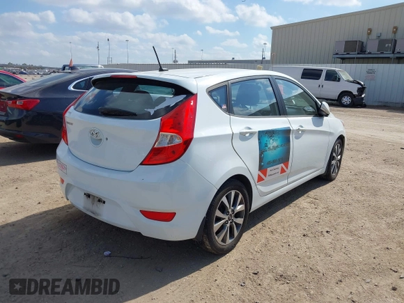 2015 Hyundai Accent Sport with VIN KMHCU5AE5FU201477, listed as a IAAI auction lot 41529347 with 189,774 mi miles. Bid and sale history available at carsss.com. Image 4.