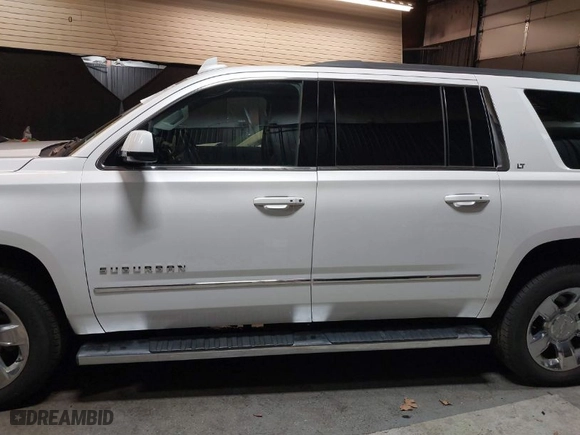 2019 Chevrolet Suburban LT with VIN 1GNSKHKC0KR211729, listed as a IAAI auction lot 41759414 with NaN miles. Bid and sale history available at carsss.com. Image 14.