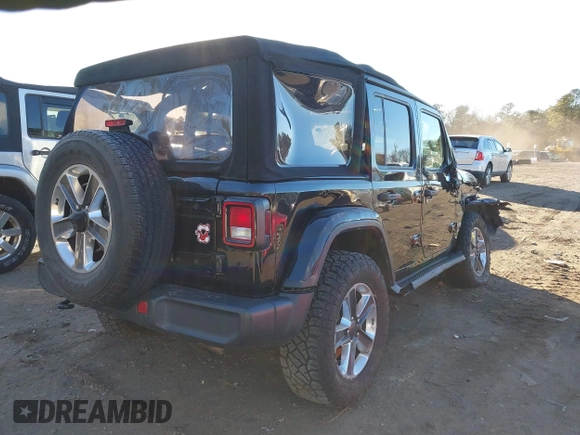 2021 Jeep Wrangler Unlimited Sahara with VIN 1C4HJXEN4MW714133, listed as a IAAI auction lot 41241040 with 82,247 mi miles and . Bid and sale history available at DreamBid. Image 4.