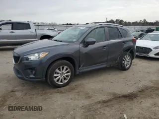 2014 Mazda CX-5 Touring with VIN JM3KE2CY0E0423991, listed as a Copart auction lot 45611695 with 121,474 mi miles and Salvage Title. Bid and sale history available at carsss.com. Image 1.