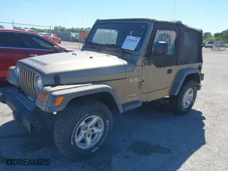 2004 Jeep Wrangler X with VIN 1J4FA39S84P737774, listed as a IAAI auction lot 41838318 with 163,839 mi miles. Bid and sale history available at carsss.com. Image 17.
