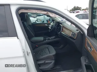 2024 Volkswagen Atlas SE z VIN 1V2JR2CA3RC508659, wystawiony jako IAAI lot #41430628 z przebiegiem 23 139 mil mil oraz . Historia ofert i sprzedaży dostępna na DreamBid. Obrazek 5.