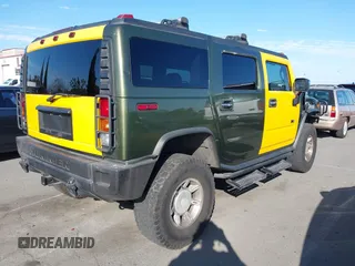 2003 Hummer H2 z VIN 5GRGN23UX3H124727, wystawiony jako IAAI lot #41697787 z przebiegiem 241 554 mil mil oraz . Historia ofert i sprzedaży dostępna na DreamBid. Obrazek 4.