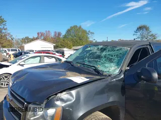 2013 Chevrolet Tahoe Commercial with VIN 1GNLC2E05DR266048, listed as a IAAI auction lot 40848505 with 95,459 mi miles and . Bid and sale history available at DreamBid. Image 6.