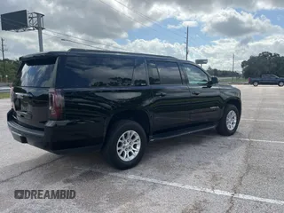 2020 GMC Yukon XL SLT with VIN 1GKS1GKC0LR288614, listed as a Copart auction lot 80264004 with 112,403 mi miles and Clean Title. Bid and sale history available at carsss.com. Image 4.