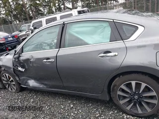 2017 Nissan Altima SV with VIN 1N4AL3AP3HC489387, listed as a IAAI auction lot 41665718 with 65,873 mi miles and . Bid and sale history available at DreamBid. Image 14.