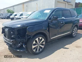 2021 Kia Telluride S with VIN 5XYP64HC9MG177780, listed as a IAAI auction lot 42510581 with 55,900 mi miles and . Bid and sale history available at DreamBid. Image 2.