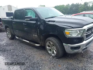 2021 Ram 1500 Big Horn with VIN 1C6SRFFT7MN633940, listed as a IAAI auction lot 42432062 with 52,041 mi miles and . Bid and sale history available at DreamBid. Image 1.