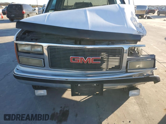 1991 GMC Sierra 1500 with VIN 2GTGC29K3M1532424, listed as a Copart auction lot 86216144 with 173,257 mi miles and Salvage Title. Bid and sale history available at DreamBid. Image 11.