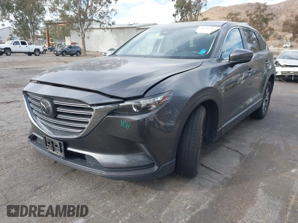2018 Mazda CX-9 Sport with VIN JM3TCABY1J0224741, listed as a IAAI auction lot 41265876 with 126,686 mi miles and . Bid and sale history available at DreamBid. Image 18.
