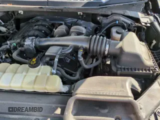 2020 Ford F-150 XL with VIN 1FTEX1EB6LKD56849, listed as a Copart auction lot 65273755 with 104,765 mi miles and Salvage title. Bid and sale history available at DreamBid. Image 14.