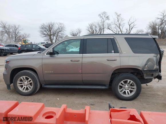 2017 Chevrolet Tahoe LT with VIN 1GNSCBKC0HR228016, listed as a IAAI auction lot 41232841 with 105,385 mi miles. Bid and sale history available at carsss.com. Image 15.
