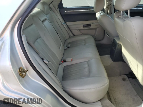 2006 Chrysler 300 C with VIN 2C3KK63H46H296625, listed as a Copart auction lot 70220974 with 104,811 mi miles and Salvage Title. Bid and sale history available at carsss.com. Image 10.