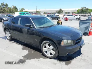 2007 Dodge Charger SXT z VIN 2B3KK43G17H709451, wystawiony jako IAAI lot #42478488 z przebiegiem 202 263 mil mil oraz . Historia ofert i sprzedaży dostępna na DreamBid. Obrazek 1.
