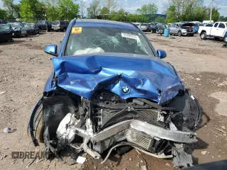 2017 BMW X1 xDrive28i with VIN WBXHT3C32H5F81460, listed as a Copart auction lot 55998515 with 123,853 mi miles and Salvage title. Bid and sale history available at DreamBid. Image 5.