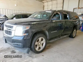 2015 Chevrolet Suburban LT with VIN 1GNSKJKC9FR714088, listed as a Copart auction lot 61371435 with 175,791 mi miles and Salvage title. Bid and sale history available at DreamBid. Image 1.