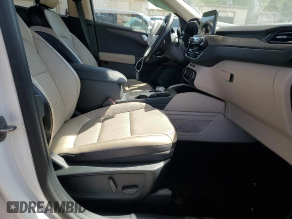 2020 Ford Escape Titanium с VIN 1FMCU9J93LUB38014, выставлен на аукционе Copart как лот 52348725 с пробегом 78 193 миль миль и Списание • Salvage title. История ставок и продаж доступна на DreamBid. Изображение 7.
