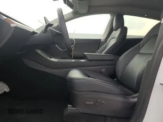 2022 Tesla Model Y Performance with VIN 7SAYGDEF1NF445085, listed as a Copart auction lot 58809495 with 14,832 mi miles and Salvage title. Bid and sale history available at DreamBid. Image 7.