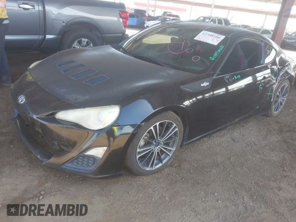 2014 Scion FR-S z VIN JF1ZNAA18E9704218, wystawiony jako IAAI lot #42348298 z przebiegiem 107 122 mil mil oraz . Historia ofert i sprzedaży dostępna na DreamBid. Obrazek 2.