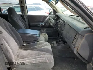 2001 Dodge Dakota z VIN 1B7HG2AX81S320355, wystawiony jako Copart lot #55410715 z przebiegiem 164 931 mil mil oraz Szkoda całkowita • Salvage title. Historia ofert i sprzedaży dostępna na DreamBid. Obrazek 7.