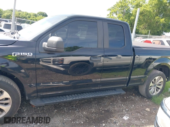 2018 Ford F-150 XL with VIN 1FTEX1CPXJKE63642, listed as a IAAI auction lot 42768090 with 147,219 mi miles and . Bid and sale history available at DreamBid. Image 14.