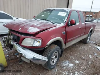 2000 Ford F-150 XL with VIN 1FTRX18L6YNA92785, listed as a IAAI auction lot 41618404 with 136,991 mi miles. Bid and sale history available at carsss.com. Image 17.