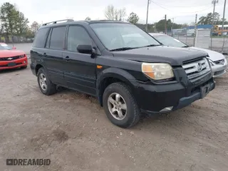 2007 Honda Pilot EX-L with VIN 2HKYF18517H513293, listed as a IAAI auction lot 41957031 with 264,875 mi miles. Bid and sale history available at carsss.com. Image 1.