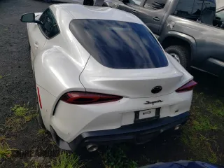2023 Toyota GR Supra 3.0 with VIN WZ1DB0G07PW057130, listed as a Copart auction lot 79969234 with 9,512 mi miles and Salvage Title. Bid and sale history available at carsss.com. Image 6.
