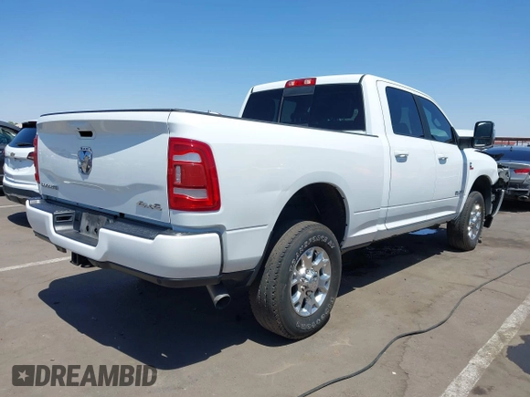 2023 Ram 2500 Laramie with VIN 3C6UR5FL2PG559276, listed as a IAAI auction lot 42281324 with 23,526 mi miles and . Bid and sale history available at DreamBid. Image 4.