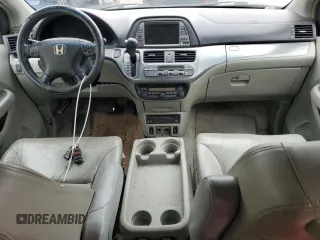 2006 Honda Odyssey EX-L z VIN 5FNRL38786B014188, wystawiony jako Copart lot #57140935 z przebiegiem Nie podano mil oraz Szkoda całkowita • Salvage title. Historia ofert i sprzedaży dostępna na DreamBid. Obrazek 8.