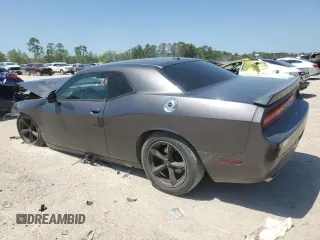 2013 Dodge Challenger SXT z VIN 2C3CDYAG6DH554175, wystawiony jako Copart lot #52185285 z przebiegiem 99 036 mil mil oraz Szkoda całkowita • Salvage title. Historia ofert i sprzedaży dostępna na DreamBid. Obrazek 2.