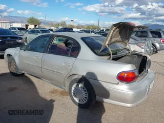 2004 Chevrolet Classic with VIN 1G1ND52F34M589464, listed as a IAAI auction lot 41566346 with 128,084 mi miles. Bid and sale history available at carsss.com. Image 3.