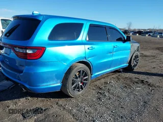 2018 Dodge Durango SRT z VIN 1C4SDJGJ1JC415720, wystawiony jako IAAI lot #41193674 z przebiegiem 63 140 mil mil oraz . Historia ofert i sprzedaży dostępna na DreamBid. Obrazek 4.