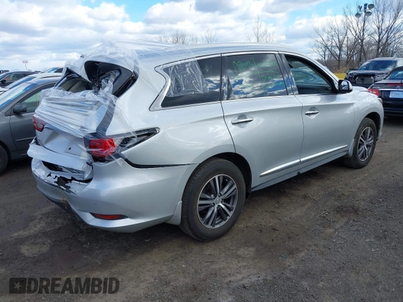 2019 Infiniti QX60 Luxe with VIN 5N1DL0MMXKC554603, listed as a IAAI auction lot 41751072 with 49,654 mi miles and . Bid and sale history available at DreamBid. Image 4.